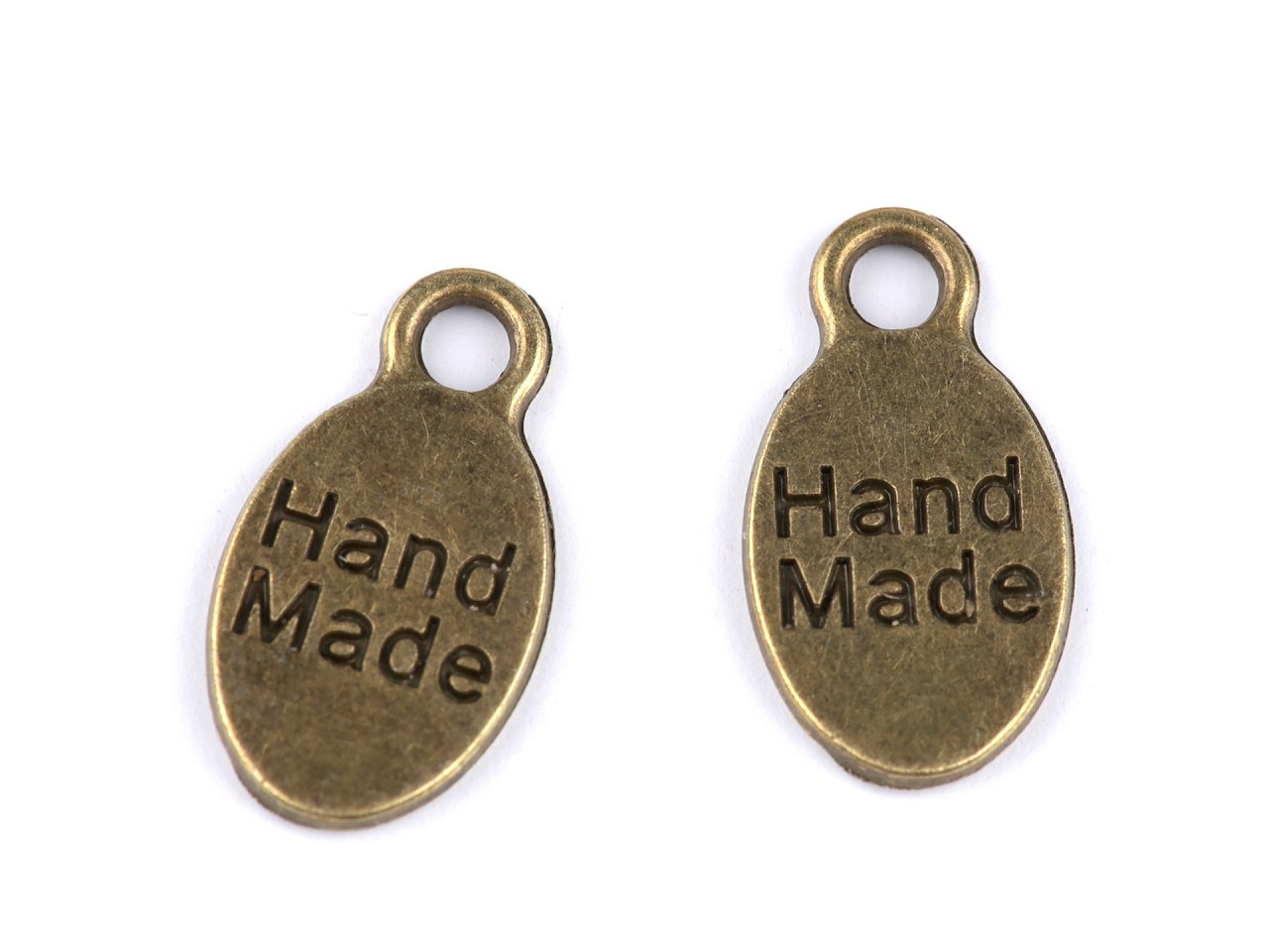 Pandantiv plăcuță ovală Hand Made, 8x15 mm, alamă antică, 10 buc. Pandantiv plăcuță ovală Hand Made, 8x15 mm, alamă antică, 10 buc.